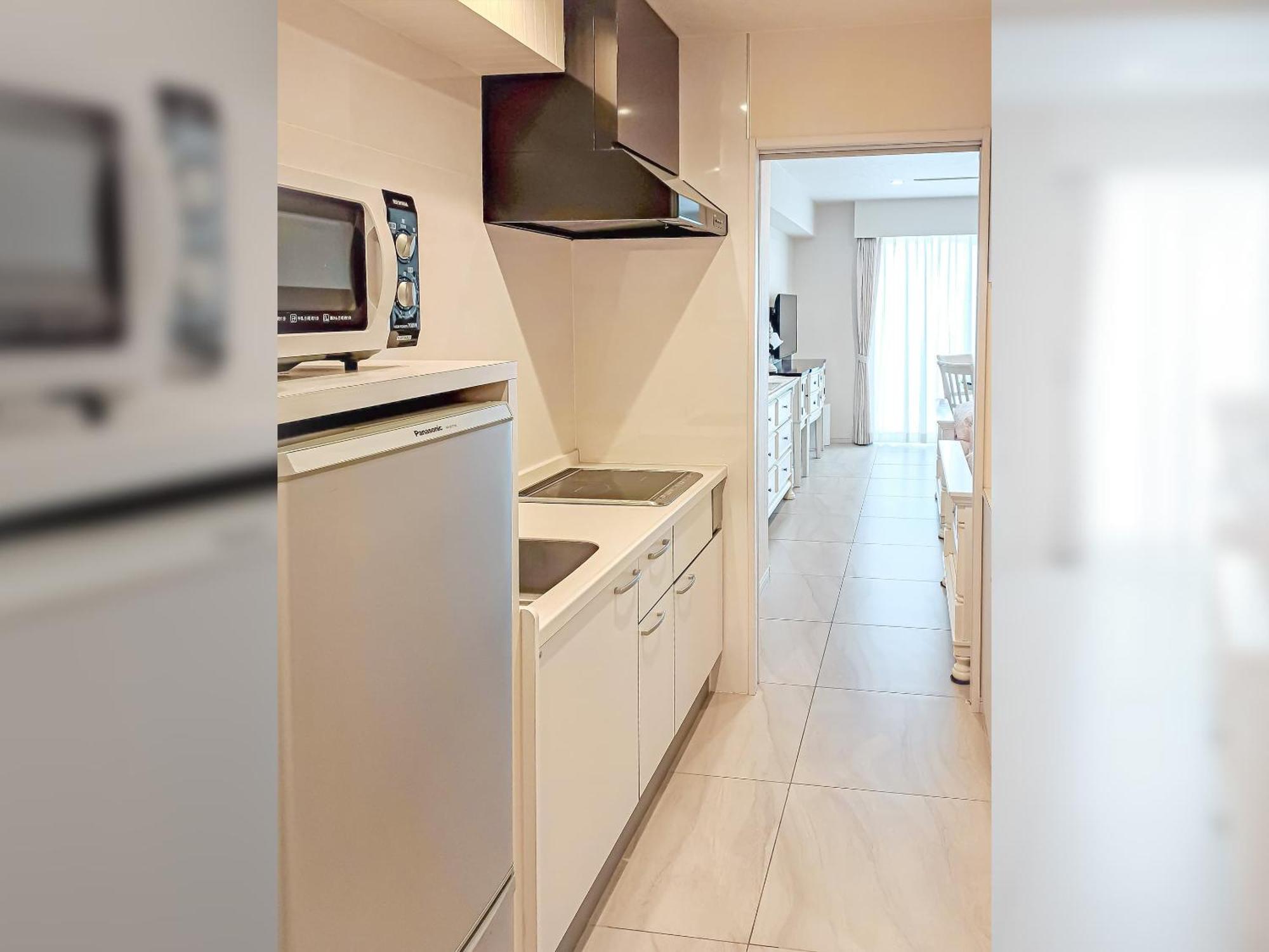 Wisteria Condominium Resort Мотобу Екстериор снимка